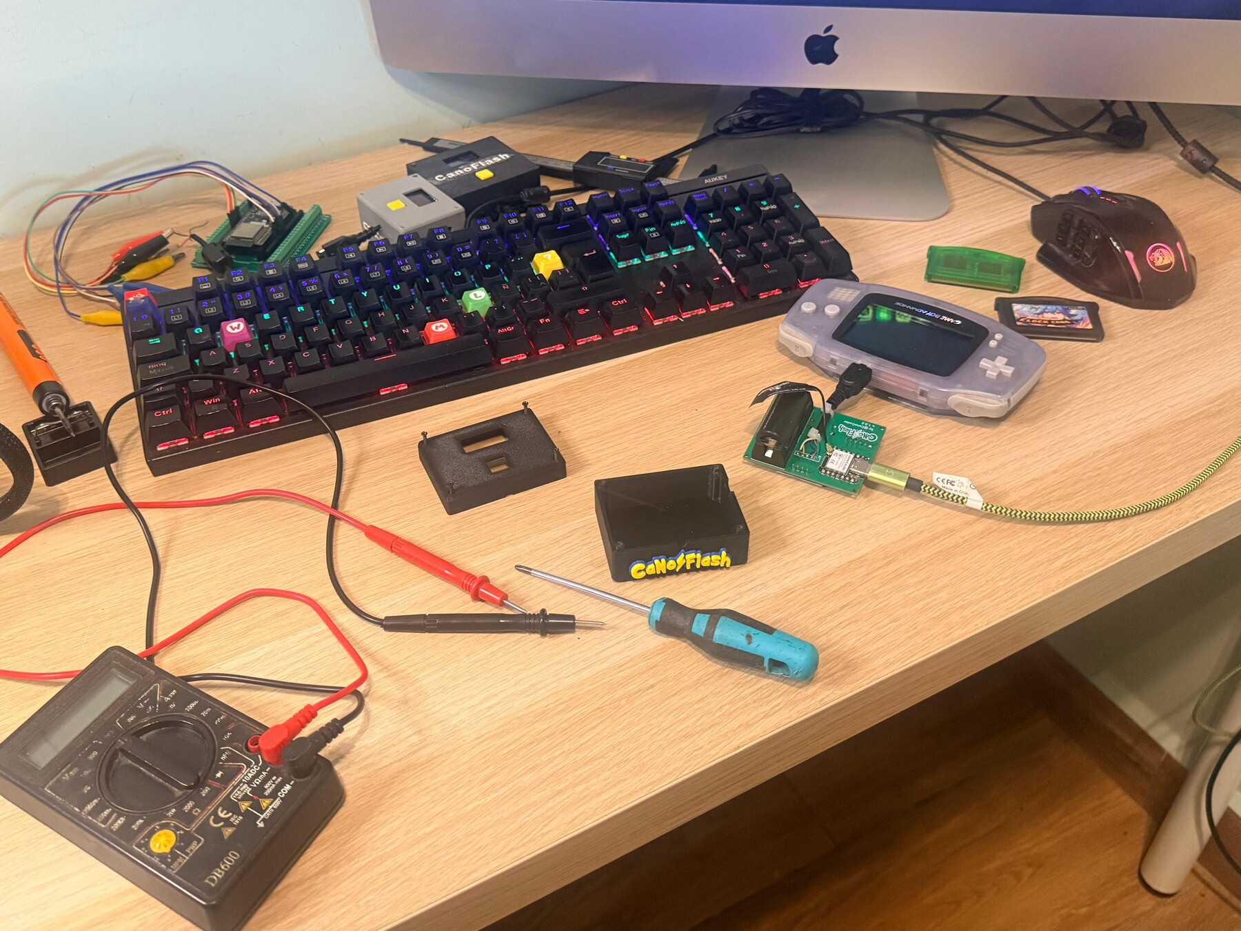 The CanoFlash prototype opened on the workbench during testing