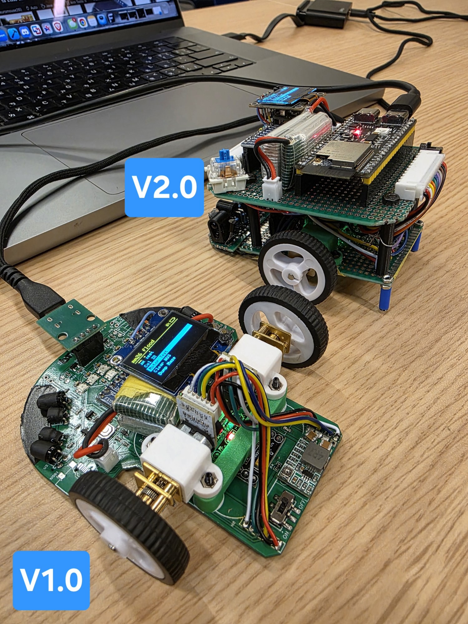 V2.0 (hand-wired protoboard) next to V1.0 (custom PCB).