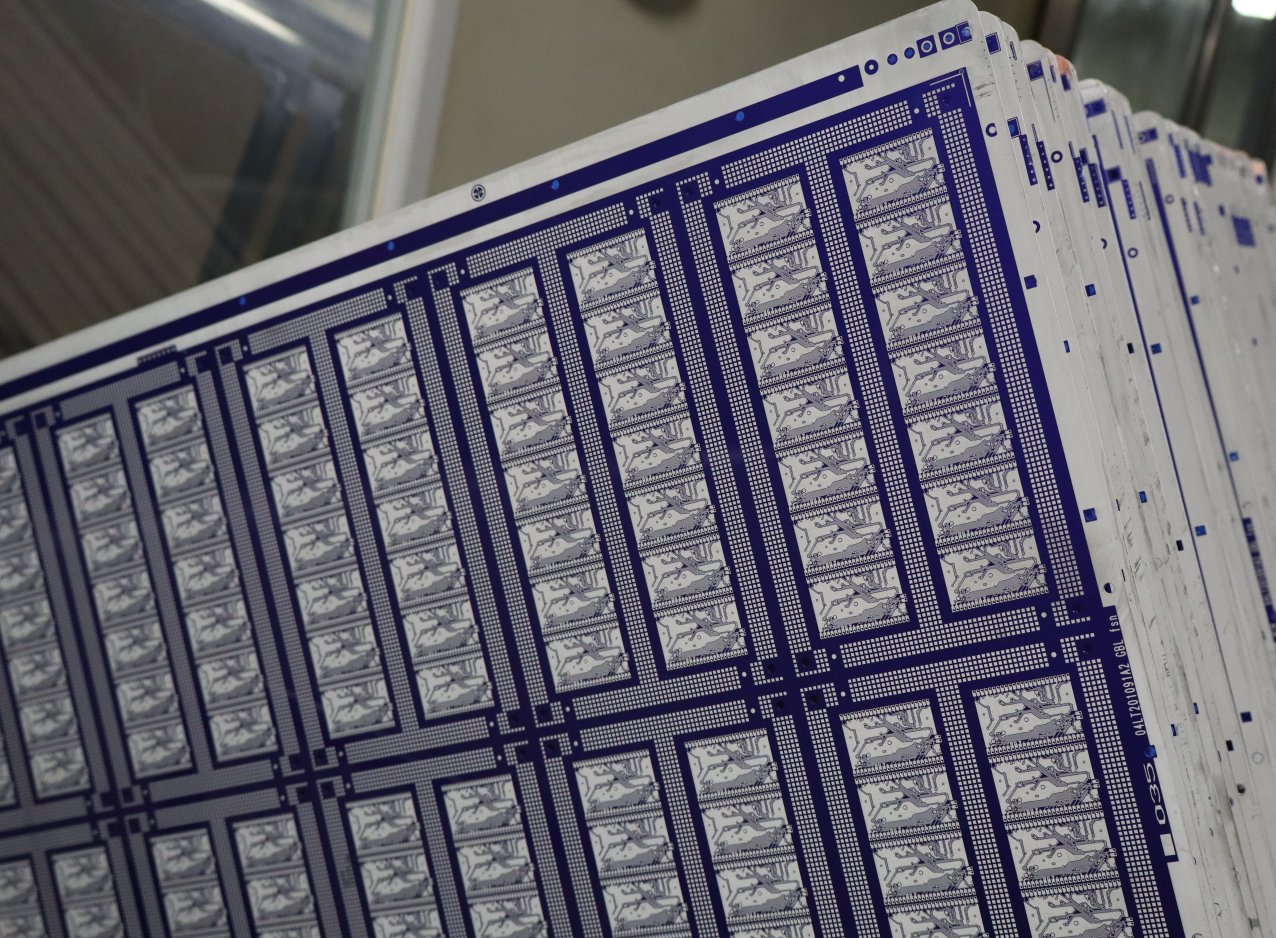 Finished PCB board after circuit pattern etching and routing process for IPC-certified electronics manufacturing and PCB assembly