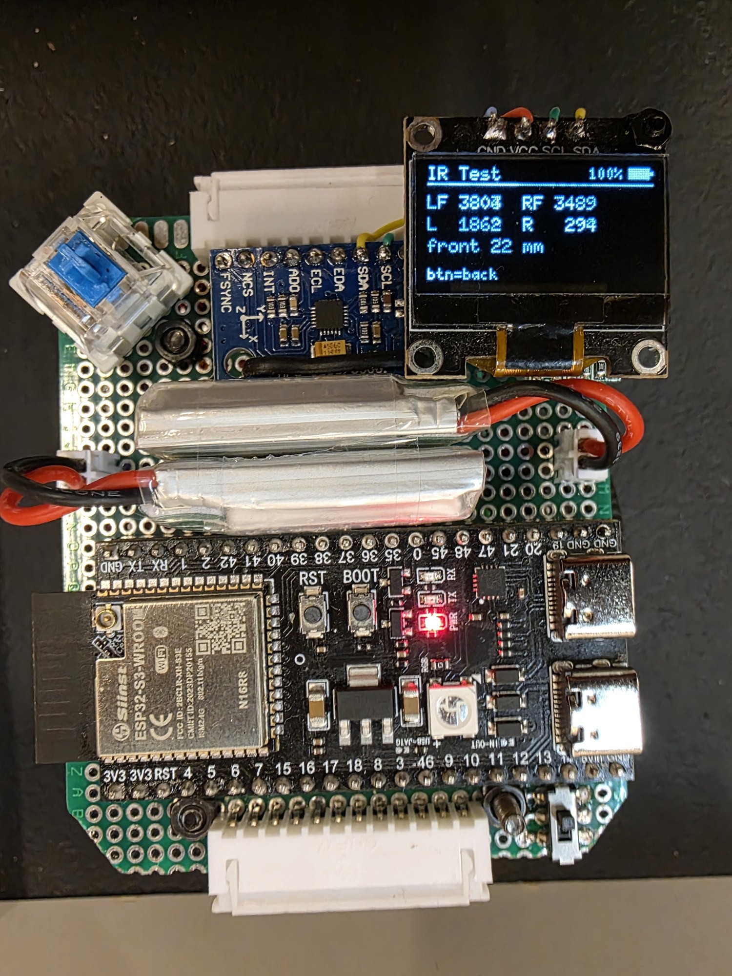 The OLED IR Test screen with live LF/L/R/RF counts and front distance.