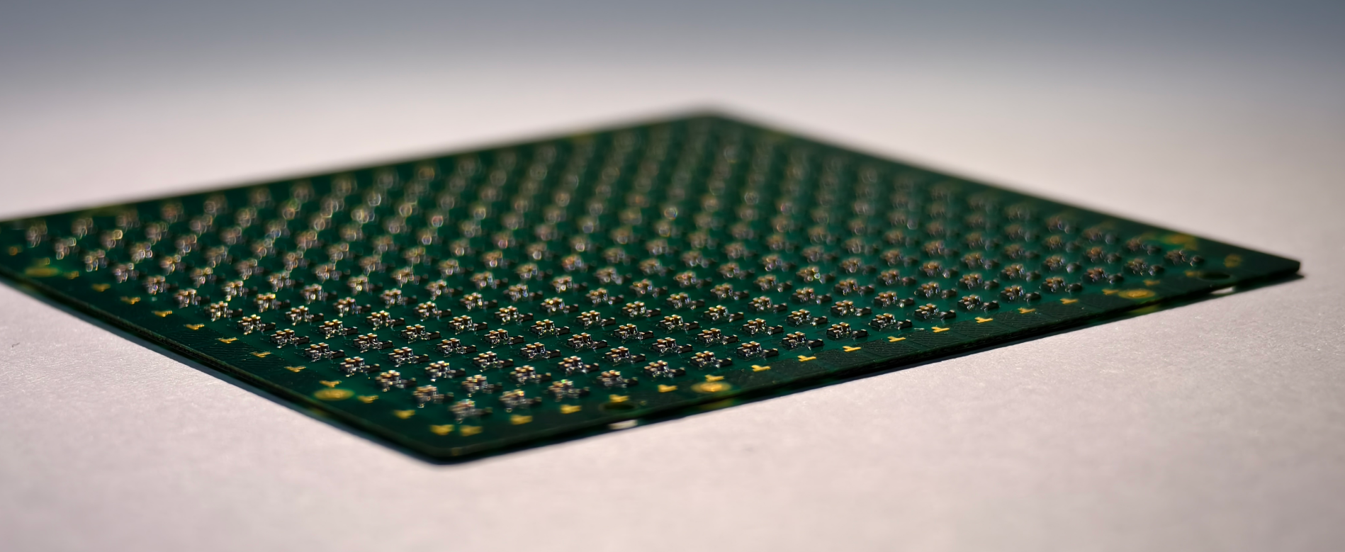 Makers and hackers working on custom PCB projects, illustrating the importance of PCBs in DIY electronics and prototyping.