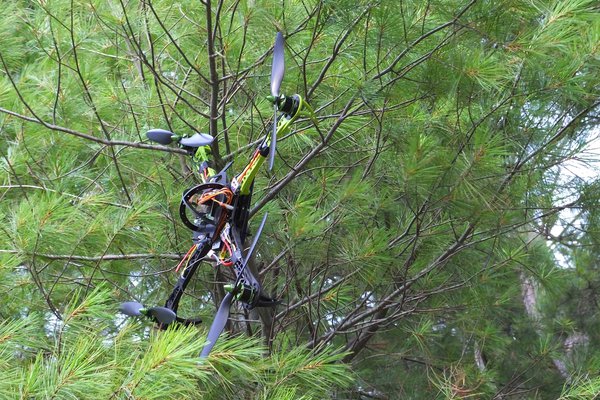 Scrap parts assemble to rescue stuff stuck in tree